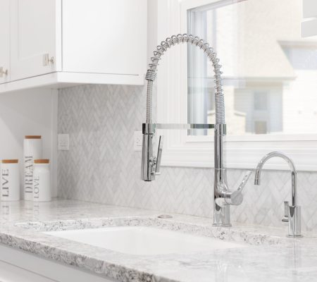 A,Kitchen,Sink,Detail,Shot,In,A,Renovated,Kitchen,With